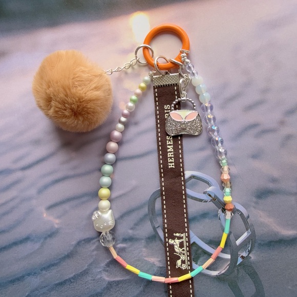 Authentic Hermes Ribbon Keychain Phone charm - Picture 1 of 2